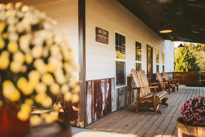 a room filled with furniture on top of a wooden chair